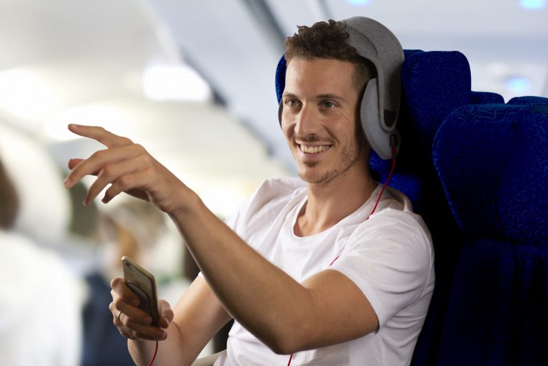 This gadget helps you sleep at 33,000ft by strapping your head to your seat