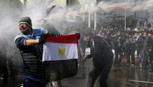 Egyptians Sprayed with unidentified Colored Liquid sprayed in Cairo