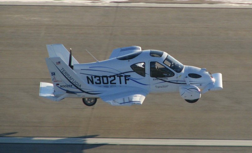 Crazy guy. Flying car. Video. Nuff said.