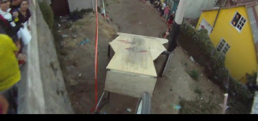 Downhill mountain bikers race through Valparaiso, Chile