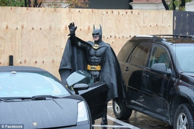 Batman gets pulled over by the police for not having a license plate on his Batmobile