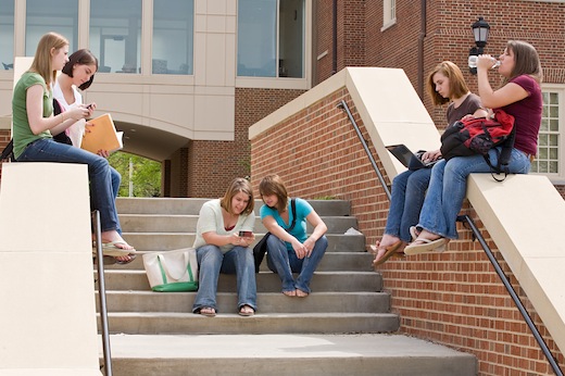 Group of college Girls on Campus Studying