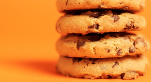 Close-up of chocolate chip cookies stacked high on top of each other