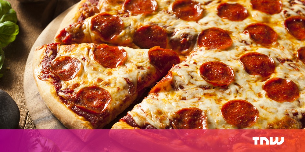 photo of Little Caesars patents robot that assembles perfect pepperoni pizza image