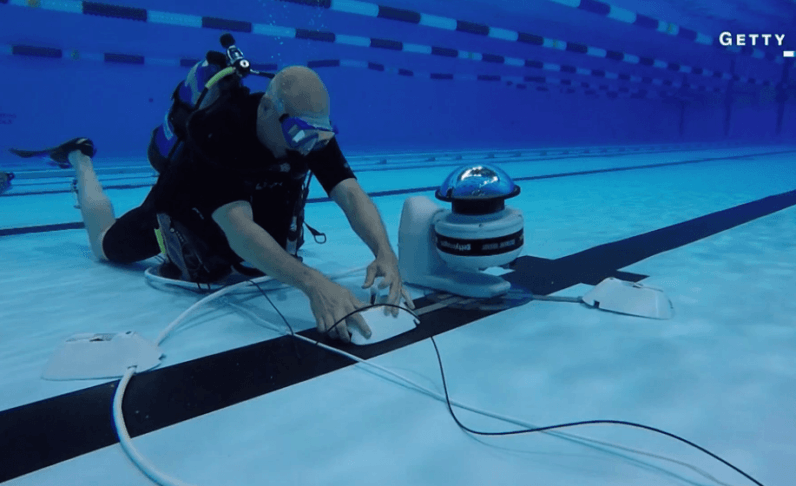 How a robot is helping photographers take the perfect underwater shot at the Olympics