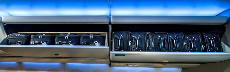 Weird but effective way to store carry-on luggage in aircraft