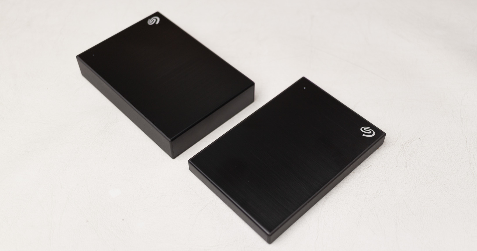 The 5TB model (left) is unfortunately far slower with write speeds than the slim 2TB model (right)