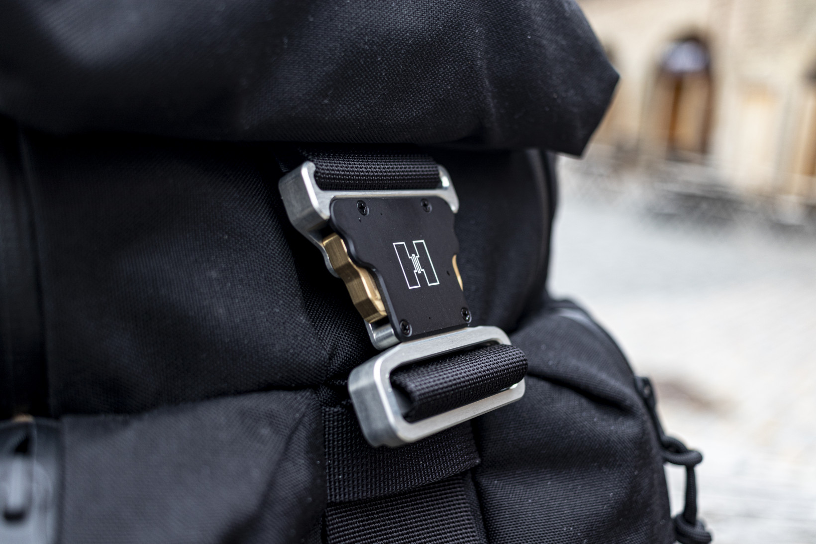 Huru's A model backpack features the company's signature clasp
