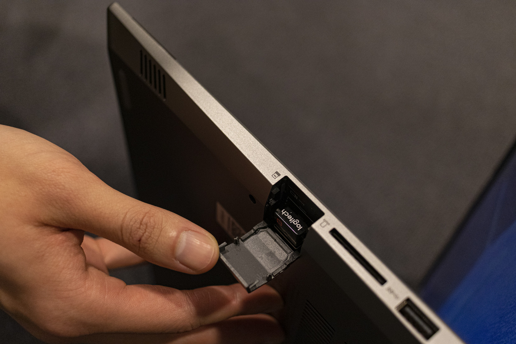 The Lenovo ThinkBook 14 has this neat hideaway slot for USB dongles