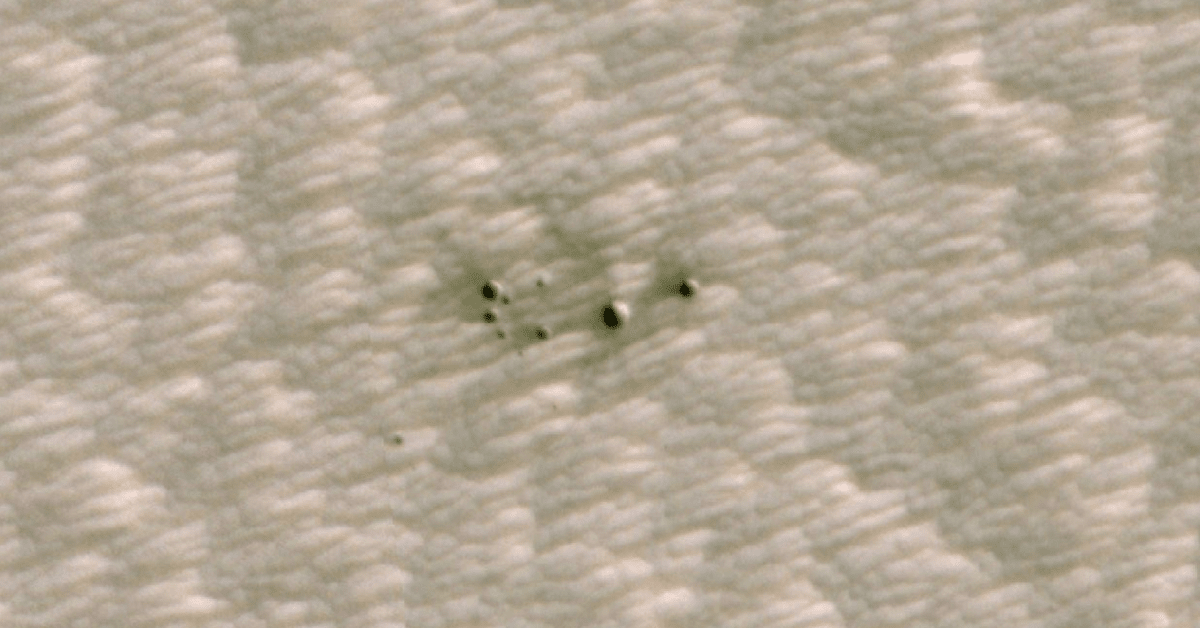 NASA releases images of the first craters on Mars discovered by AI