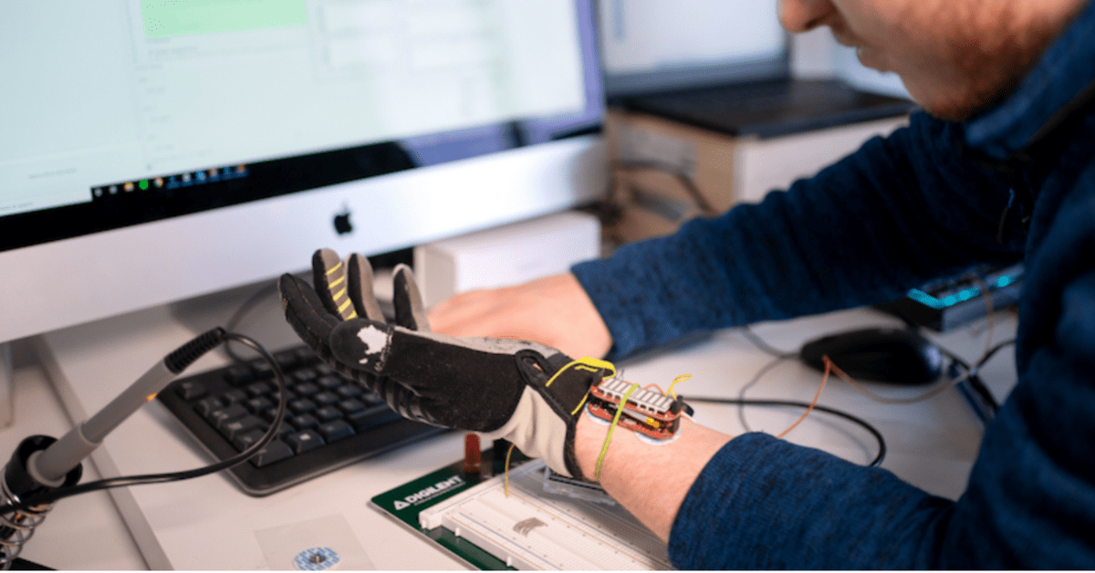 This robotic glove uses AI to help people with hand weakness regain muscle grip