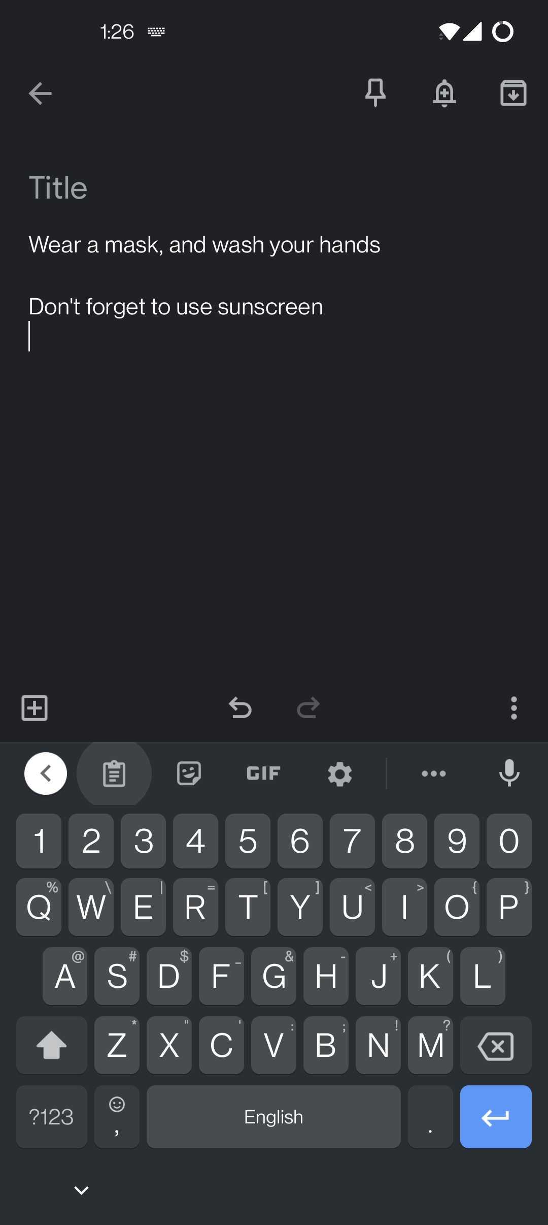 Find the clipboard button on Gboard in the top row of keys