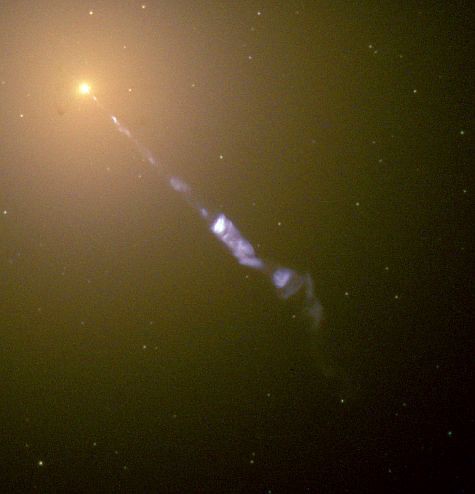 The massive jet emanating from M87, seen by the Hubble Space Telescope