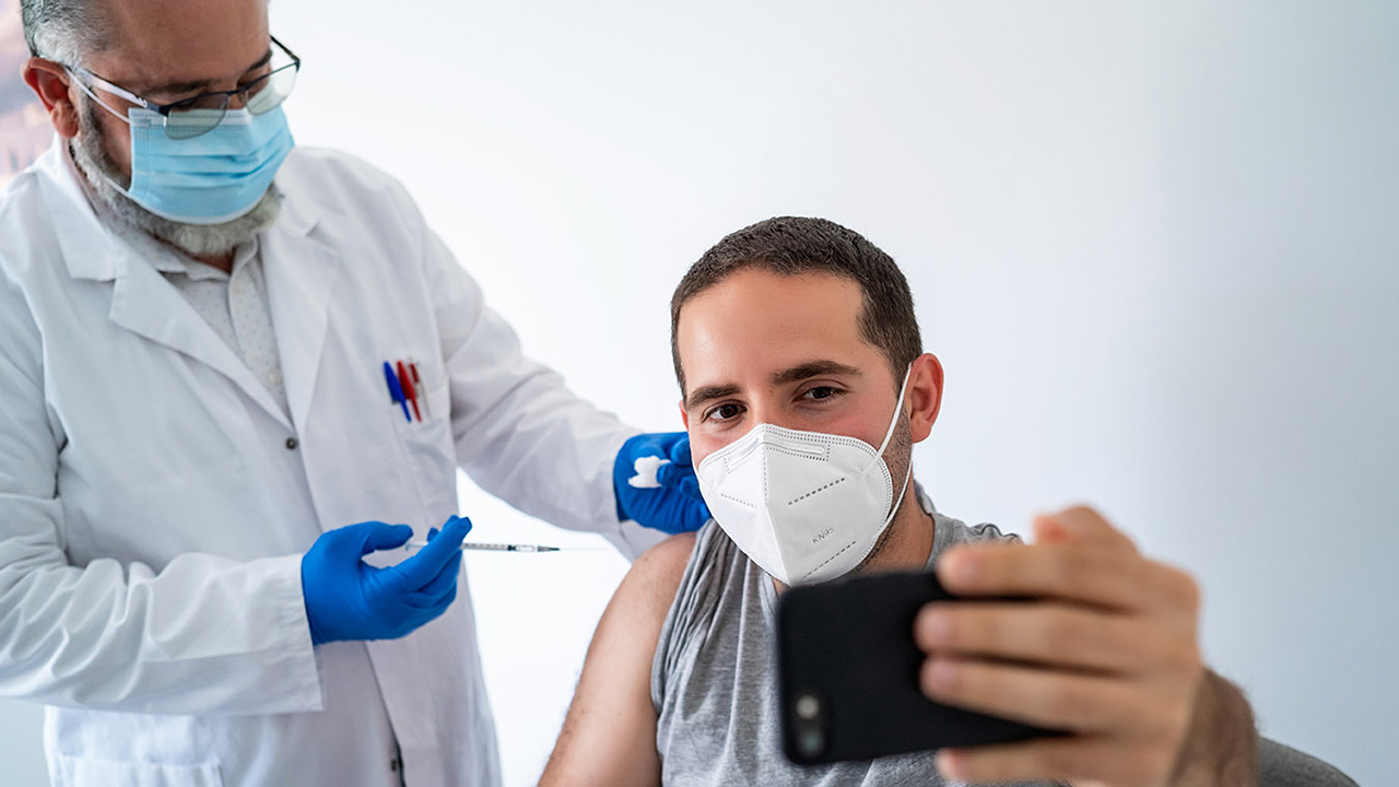 Post your vaccine selfie — it might encourage others to get the jab