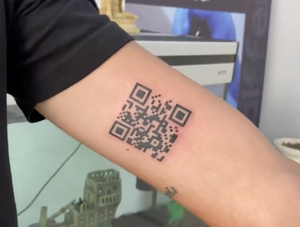 Italian dude gets a QR code tattoo to prove he’s covid-free