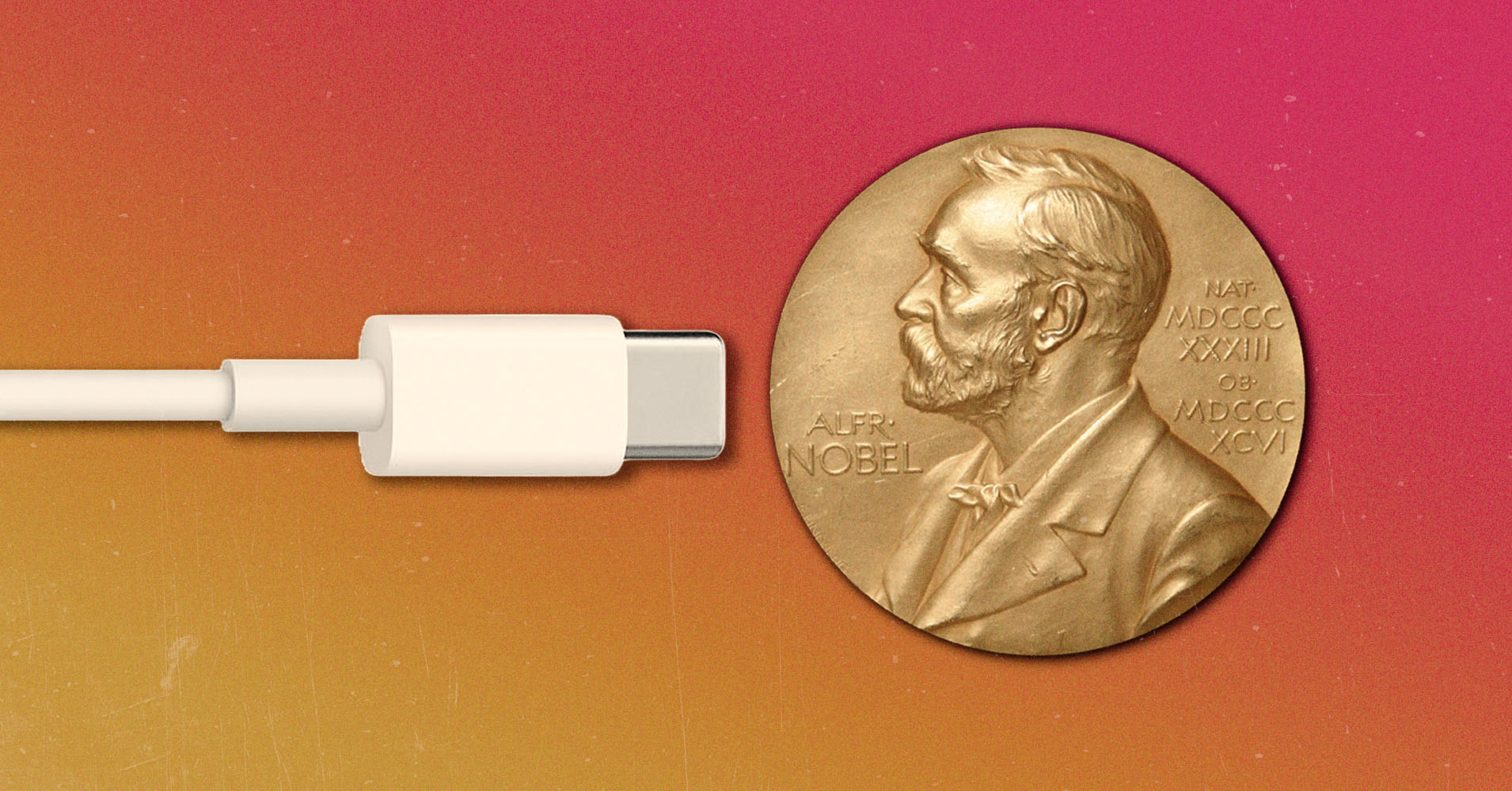 A USB-C cable next to a Nobel Prize medal