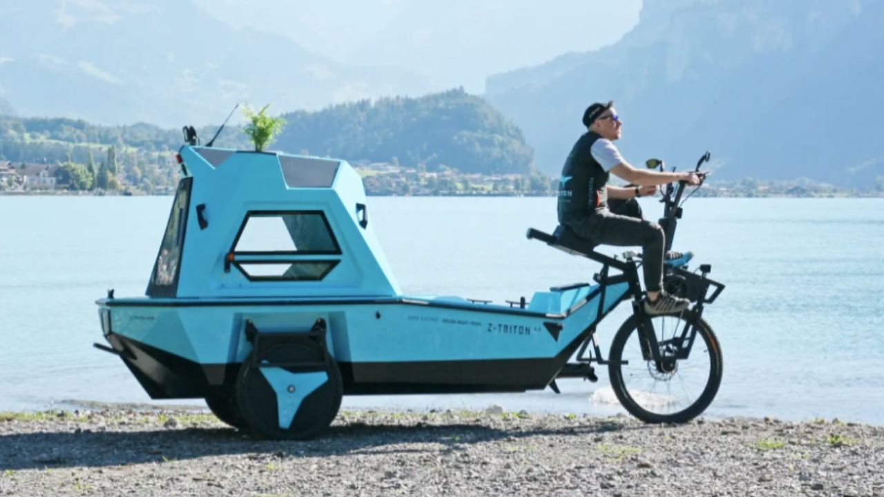 This electric tricycle can transform into a camper AND a boat