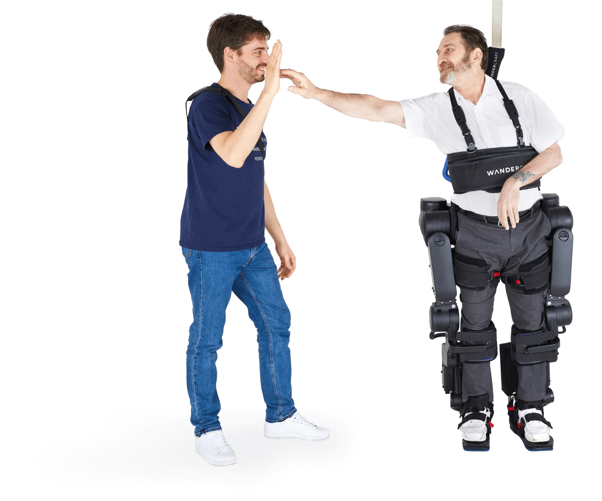 A patient in the Atalante X exoskeleton high-fiving a physical therapist