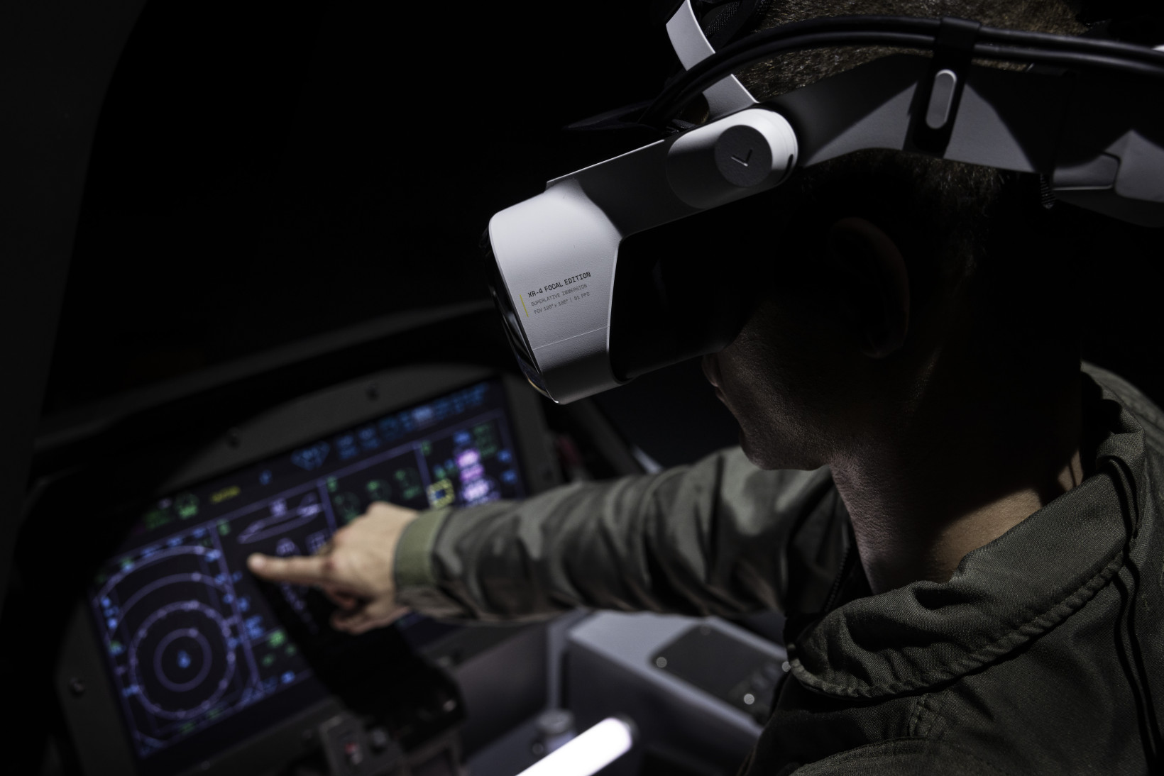 Photo of a pilot using the Varjo headset in a cockpit
