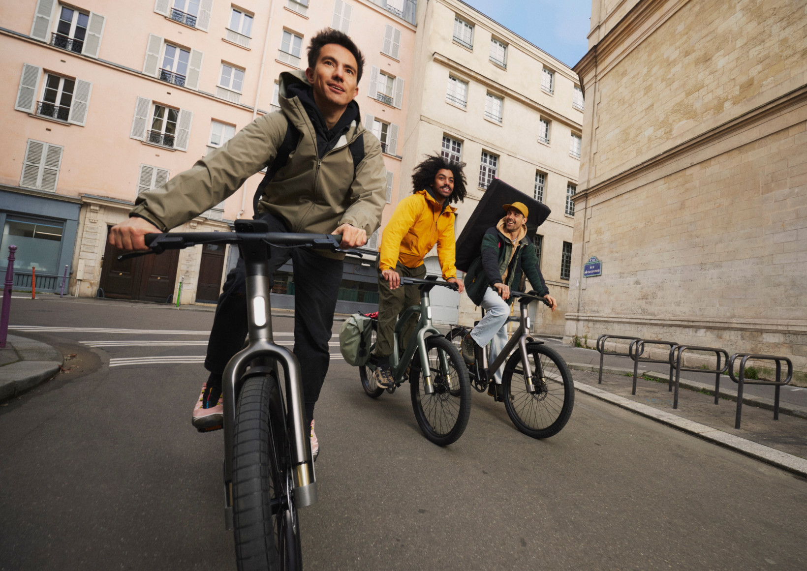 Three guys on Cowboy bikes in Paris