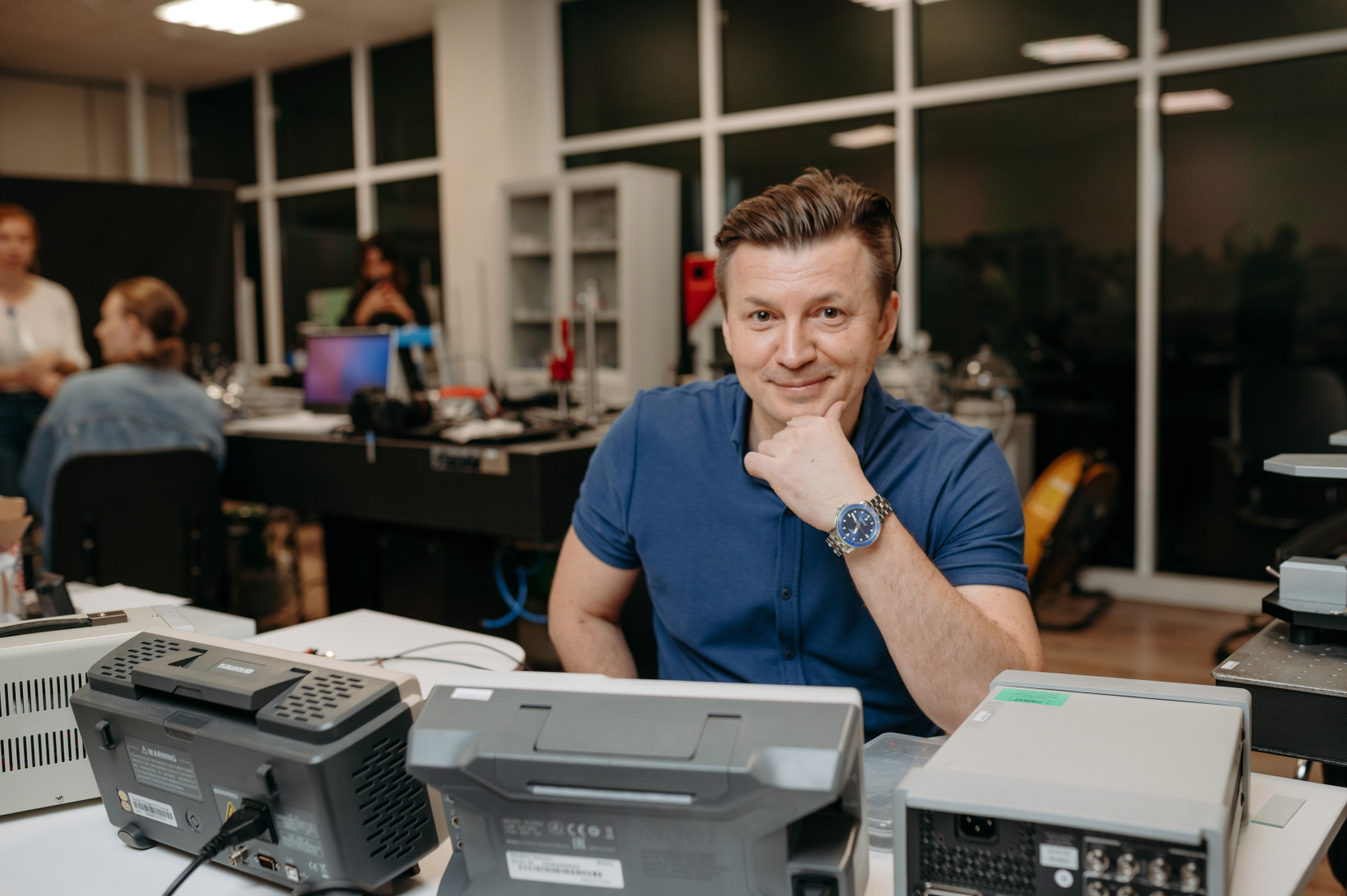 Photo of Xpanceo co-founder Valentyn Volkov behind a desk. Volkov wants to us the graphene-like materials in smart contact lenses