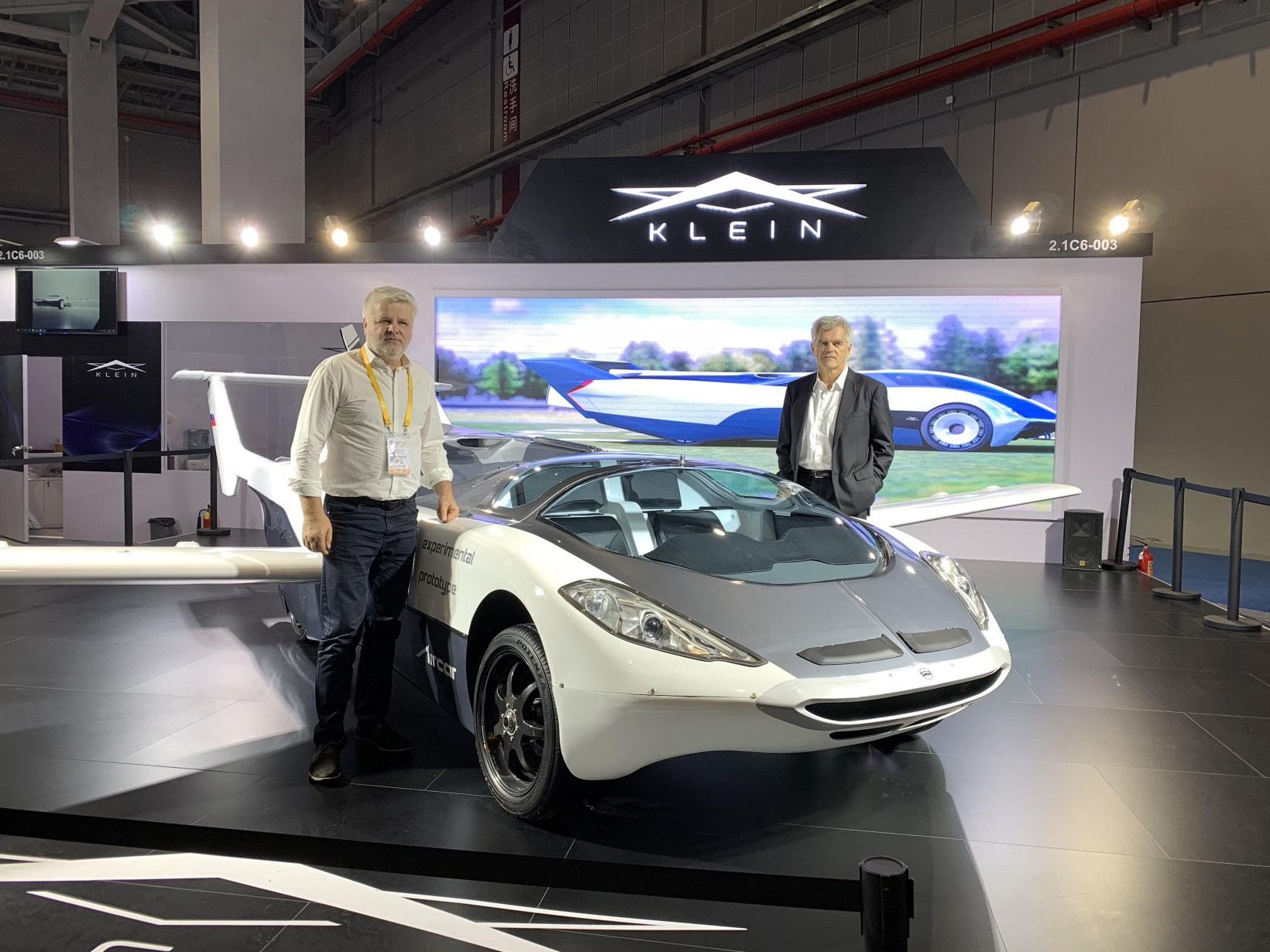 Klein Vision founders Stefan Klein and Anton Zajac standing next to the AirCar