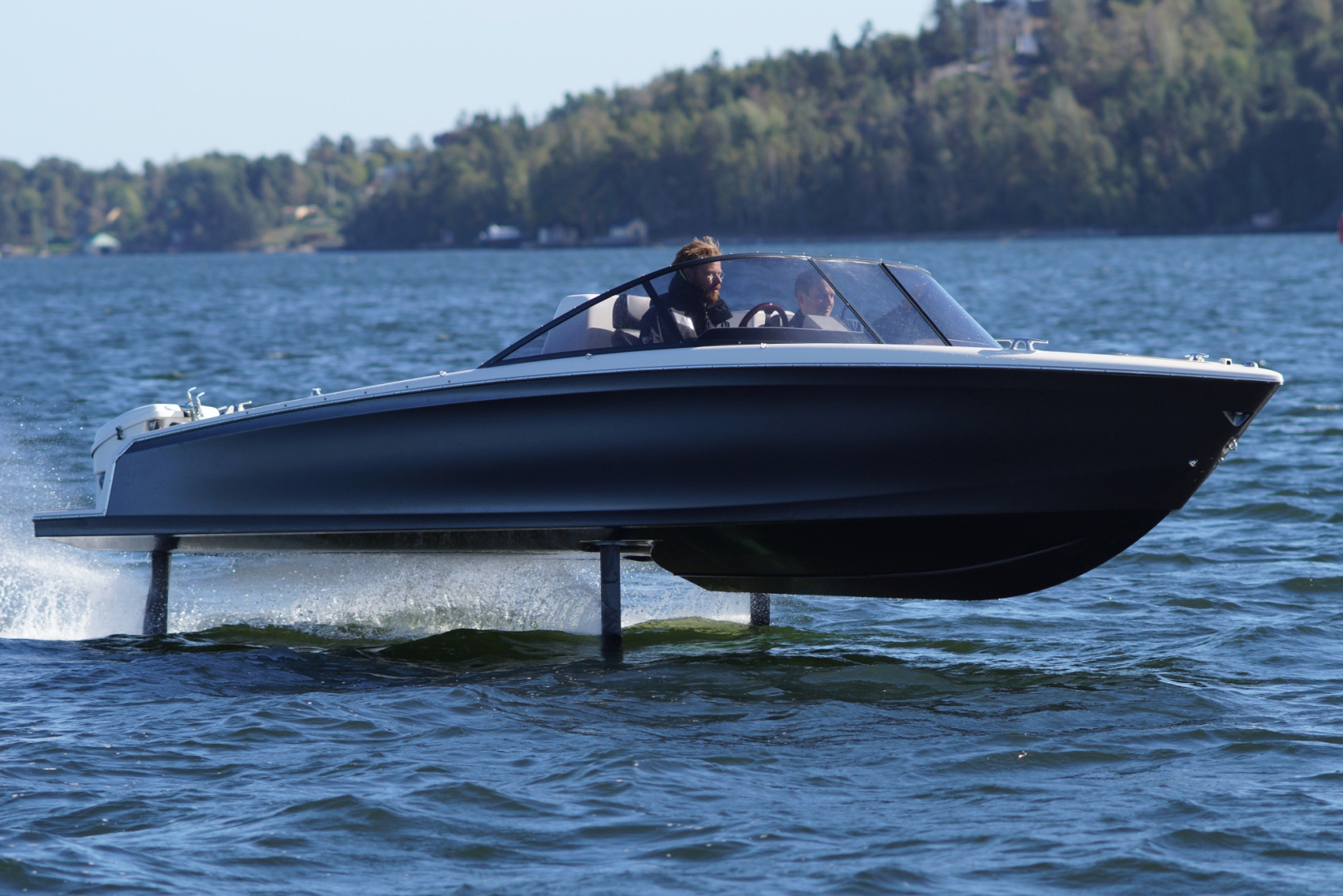 An image of Gustav Hasselskog test driving the first C-7 prototype hydrofoil boat. Credit: Candela